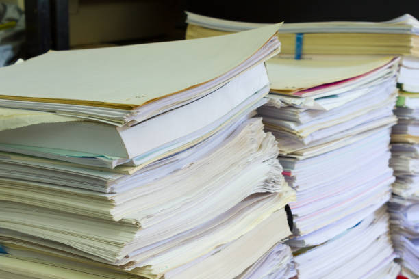 istock Stacks of paper in my office. 936991198