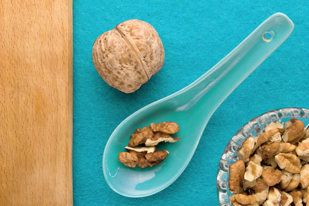 Menu background, walnuts on a blue background