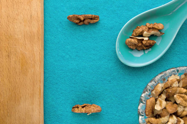 Menu background, walnuts on a blue background
