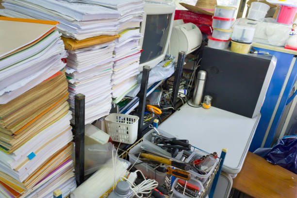 istock Stacks of paper in my horrible office. 936991408