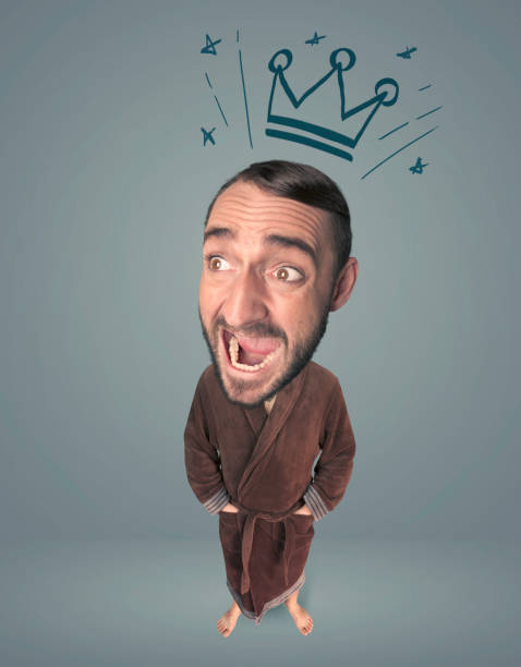 istock Big head person with crown 936991498