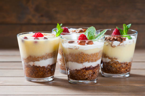 istock Dessert with berries, jelly, cream, nuts and mint leaf 936994588