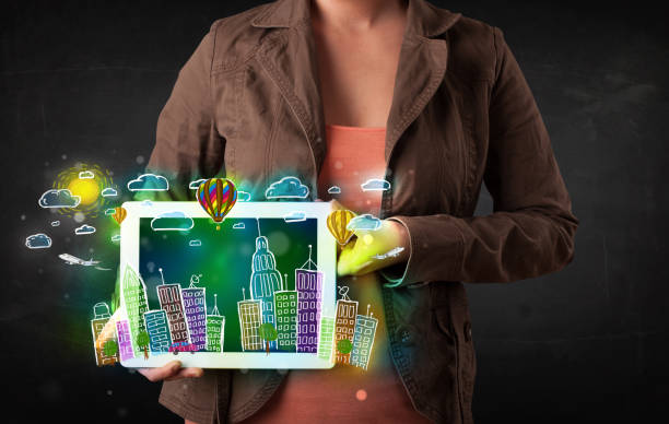 istock Young person showing tablet with hand drawn cityscape 936994704