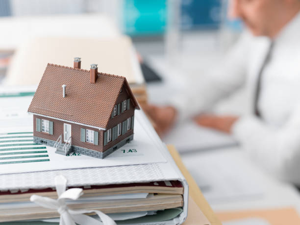 istock Real estate, mortgage loans and paperwork 936995206