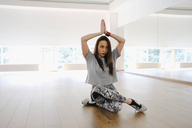 istock Young attractive woman practicing yoga 936996026