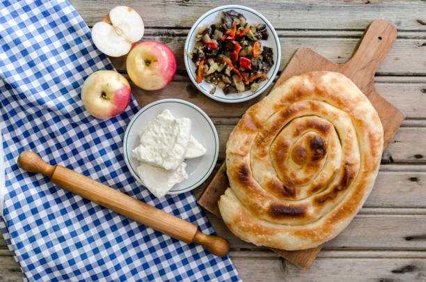 Burek with mixed fruit and cheese Burek with mixed fruit and cheese on wooden background english cuisine stock pictures, royalty-free photos & images