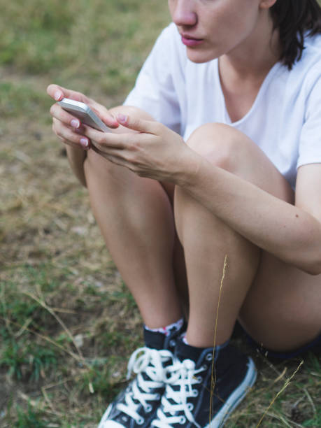 istock Close up of woman's hands holding a smartphone 937002498