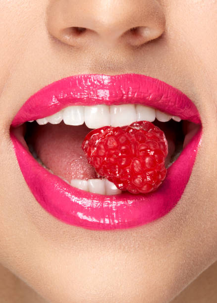 istock Pink Lips. Woman With Candy In Mouth. 937003092