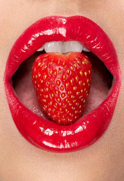 istock Lips. Woman With Red Lipstick And Strawberry 937003180