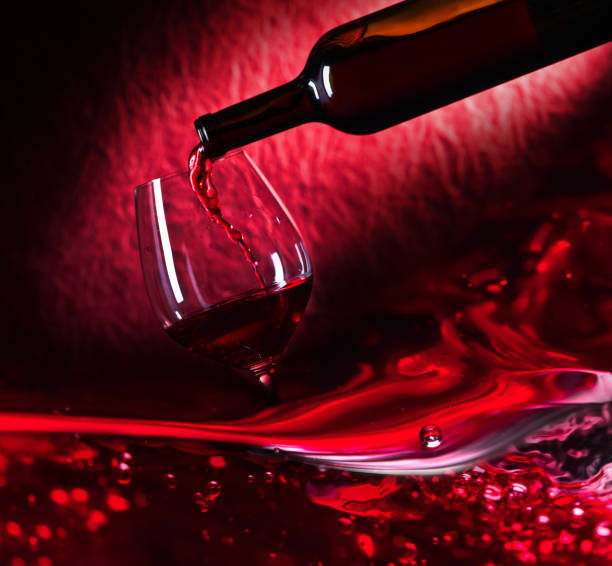 istock Bottle and glass of red wine . 937003574
