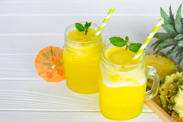 istock pineapple smoothie and pineapple fruits 937018344