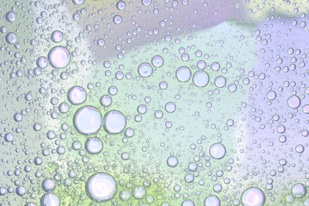 istock Bubbles background of pink and green tones 937018498