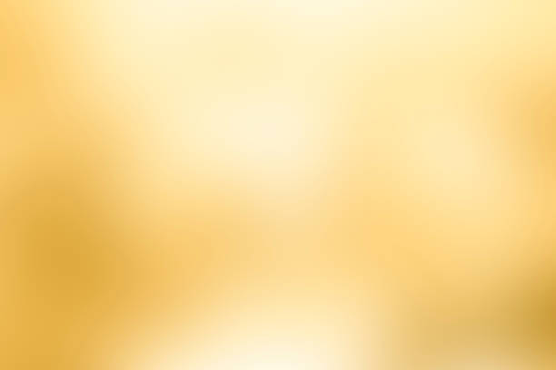 Abstract defocused yellow to orange soft background stock photo