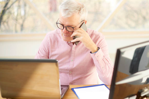 istock Senior businessman at the office. 937031738