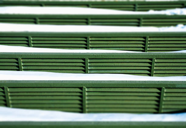 Wooden benches in a recreation park in the metropolis