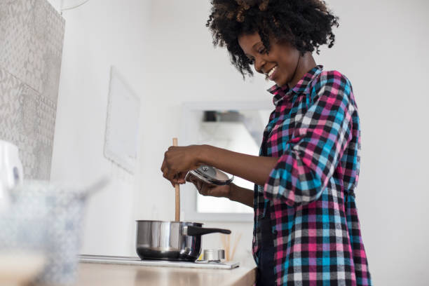 istock African woman cooking 937037926
