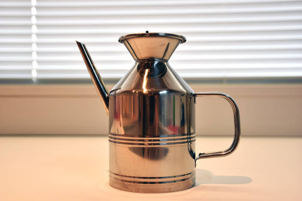 istock Kitchen oil holder in chromed steel 937039140