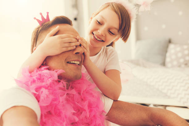 istock Happy cheerful man having his eyes covered 937042282