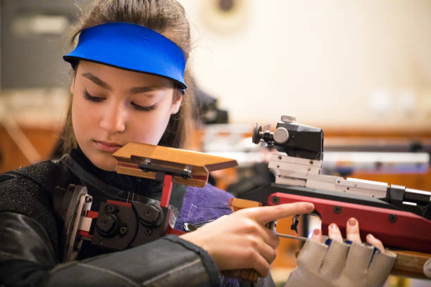 istock Beautiful female sport shooter 937042742
