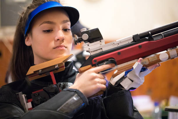 istock Beautiful female sport shooter 937045564