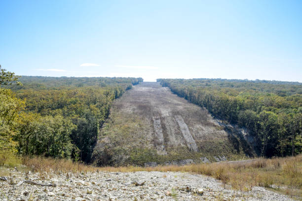 A clearing in the forest for the gas pipeline. Underground gas pipeline.