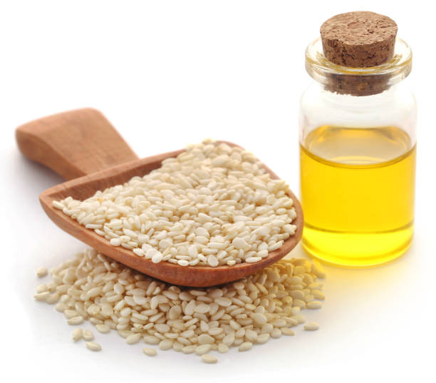 istock Peeled sesame seeds with oil 937053608