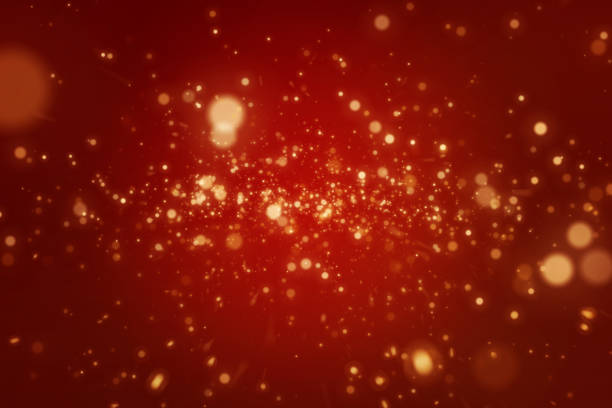 istock Gold particles on red background christmas holidays concept 937057364
