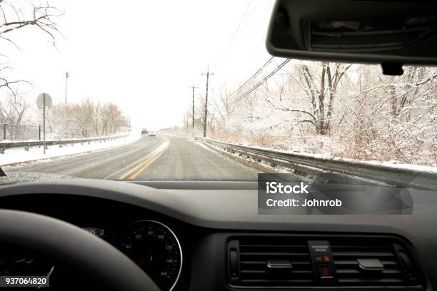 Winter Driving On A Slippery Road Stock Photo - Download Image Now - Car, Dashboard - Vehicle Part, Windshield