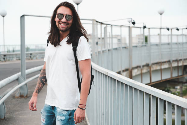 istock Smiling man hang out, walking in the city 937074740