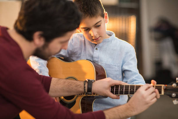 istock My brother teaches me the best 937082276