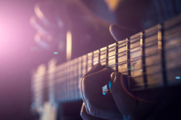 istock Rock concert, a musician is playing the guitar 937088094