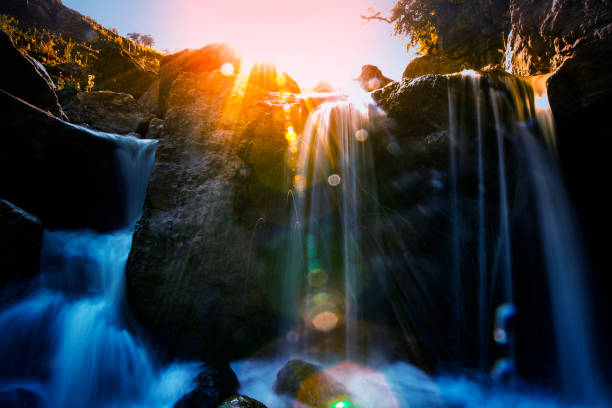 istock Beautiful and dramatic sunset in  waterfalls 937100418