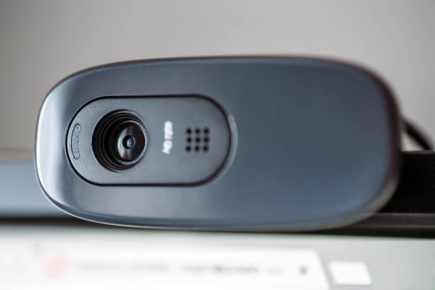 istock Modern web camera on computer monitor. Digital device for online conference, broadcasting and video communication by internet 937103122