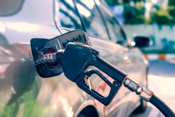 istock Car refuel in gas station 937107256
