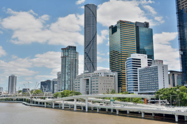 Brisbane, Queensland, Australia -  January 6, 2018. View of river waterfront in Brisbane with modern commercial and residential buildings, motorways and bridges.