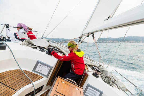 istock Woman Enjoying Sailing Course on Rippled Sea 937111800