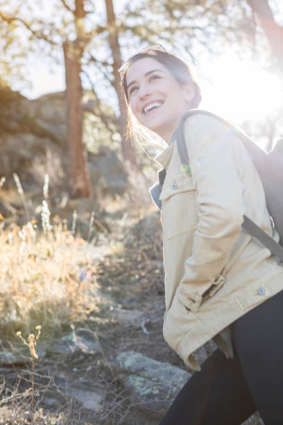 istock Woman hiking on a mountain trail 937112034