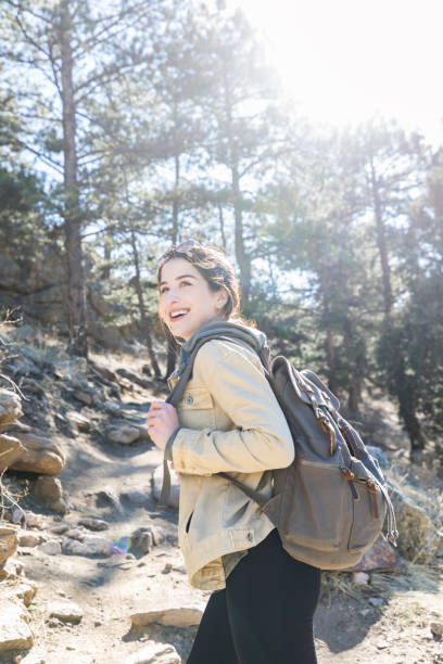 istock Adventurous young woman on hiking trail 937112082