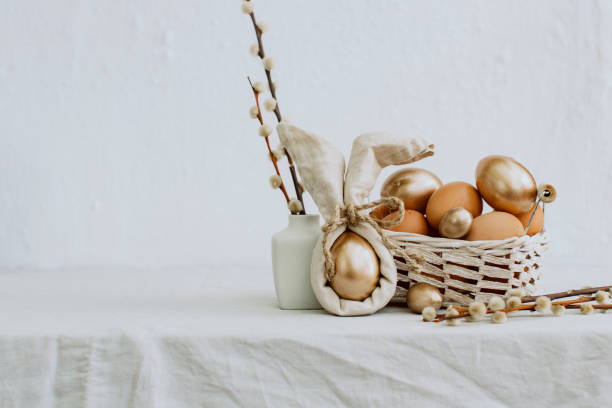 istock Gold Easter Eggs in Natural Linen Textile. Vintage style 937117382