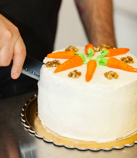 istock Carrot cake with cream cheese frosting 937123642