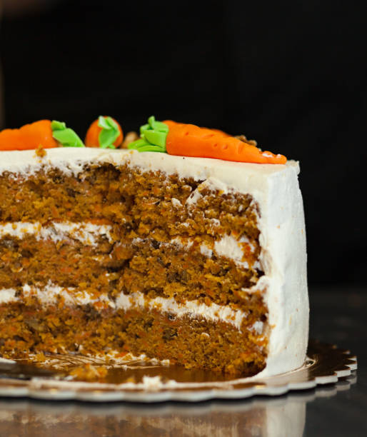 istock Carrot cake with cream cheese frosting 937123822