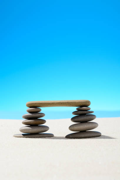 istock Zen stones on the sandy beach 937126822