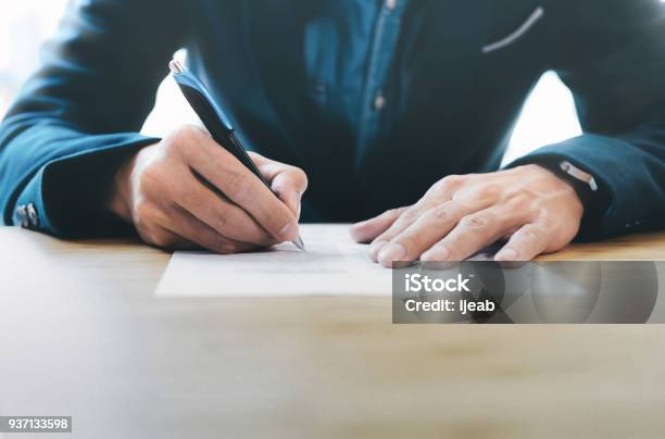 Businessman Signing Contract Making A Deal Stock Photo - Download Image Now - Writing - Activity, Letter - Document, Handwriting