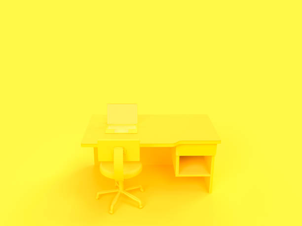 istock Laptop on table and chair yellow pastel 937135362