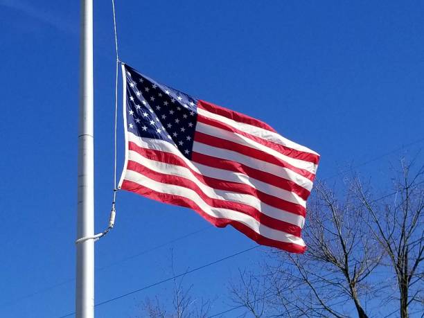 istock American Flag in the sun 937138436