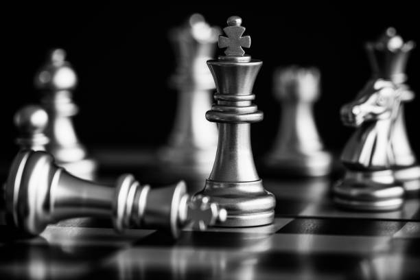 istock Strategy chess battle Intelligence challenge game on chessboard. Success the strategy concept. Chess business leader and success idea. Chess strategy game business competition success play. 937144840
