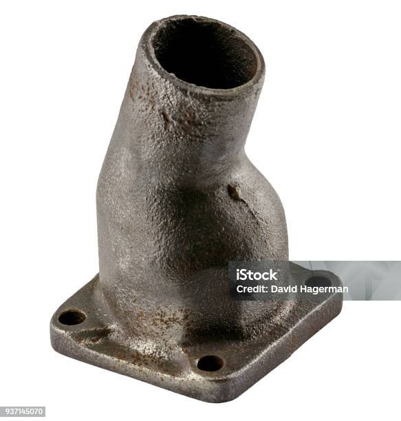 Antique Vintage American Automobile Cast Iron Thermostat Housing Assembly On A White Background Stock Photo - Download Image Now