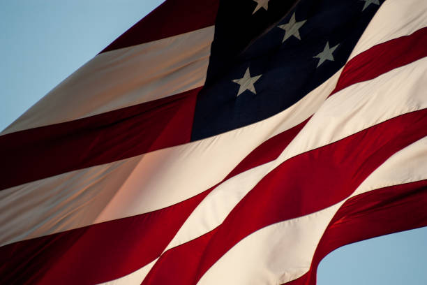 istock American flag close up with warm sunlight illuminating 937153368
