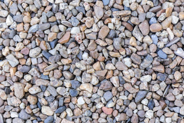 istock Stone pebbles texture or stone pebbles background for interior exterior decoration and industrial construction concept design. 937171494