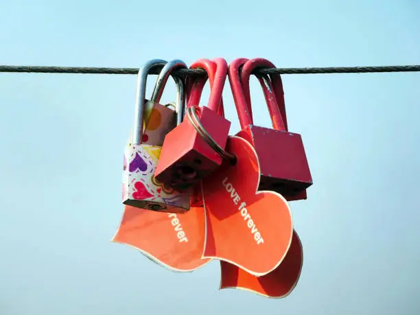 Photo of Colorful Love Locks and the Blue Sky